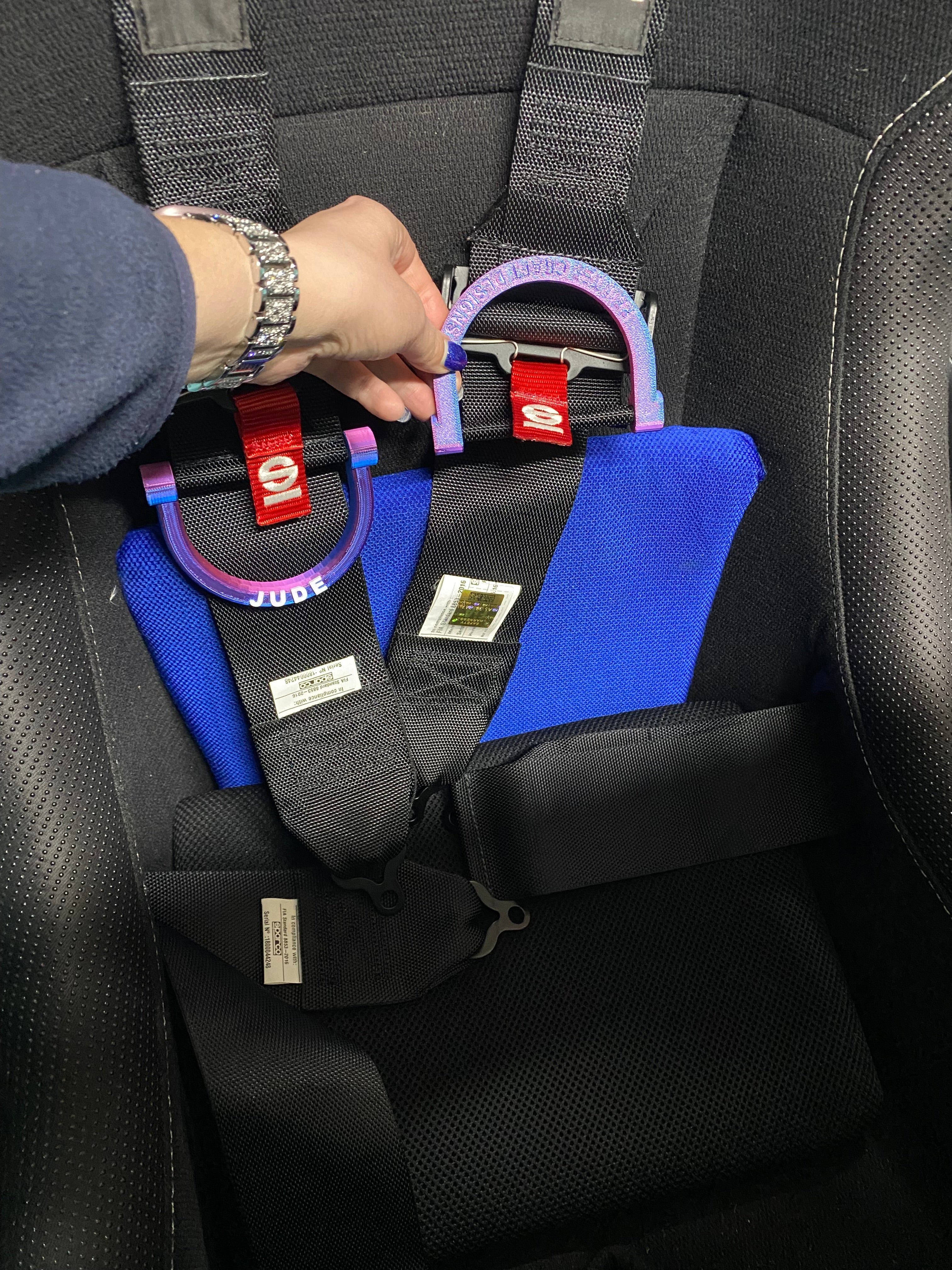 Racecar seatbelt/harness handle